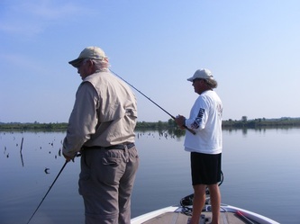 two men fishing on caddo lake